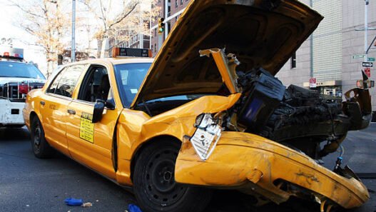 "the innards of a crashed taxicab on broadway and 115th st., new york city."