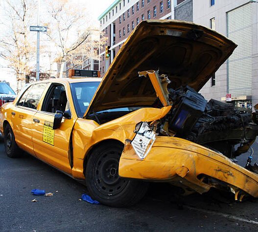"the innards of a crashed taxicab on broadway and 115th st., new york city."