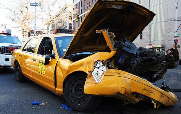 "the innards of a crashed taxicab on broadway and 115th st., new york city."